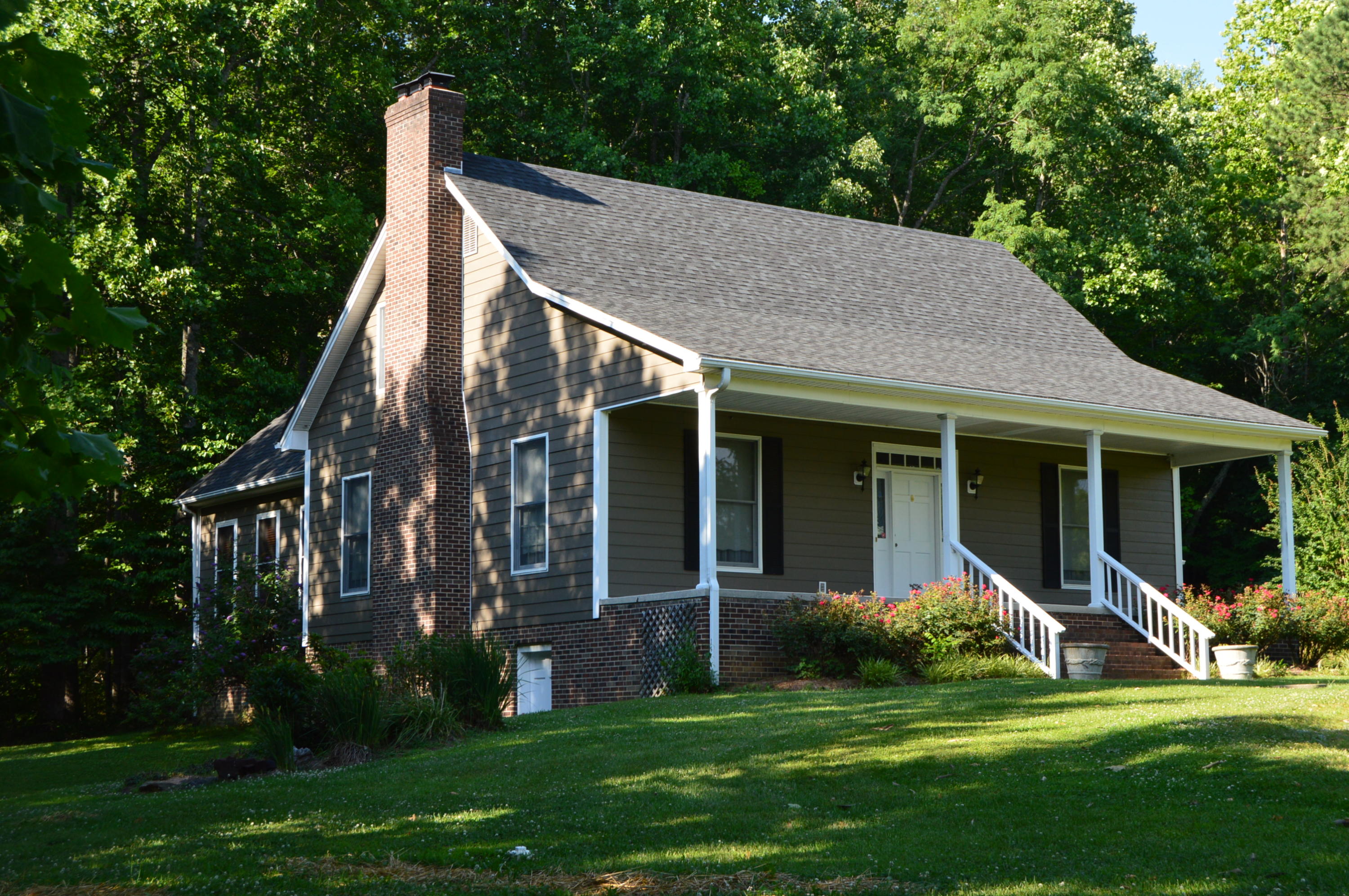 468 Liberty Road Penhook, VA 24137 - Photo 1 of 54 a view of a house with backyard porch and garden