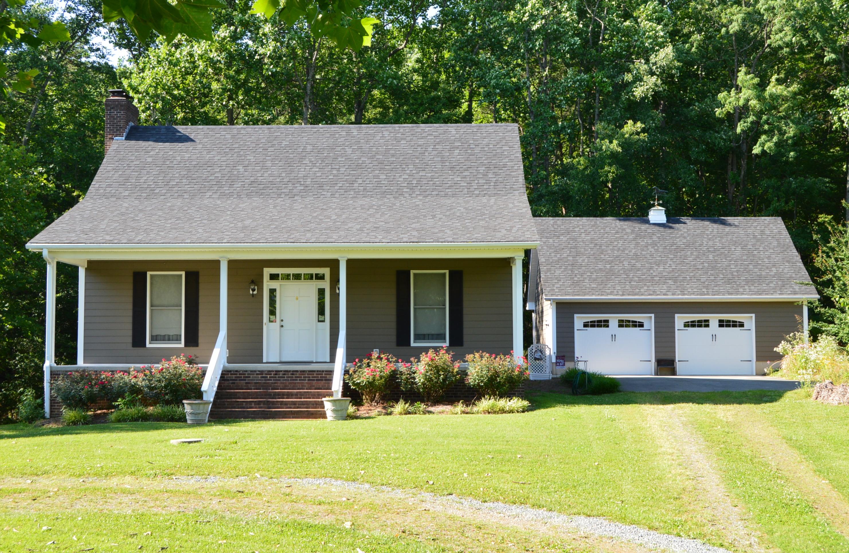 468 Liberty Road Penhook, VA 24137 - Photo 2 of 54 front view of a house with a yard
