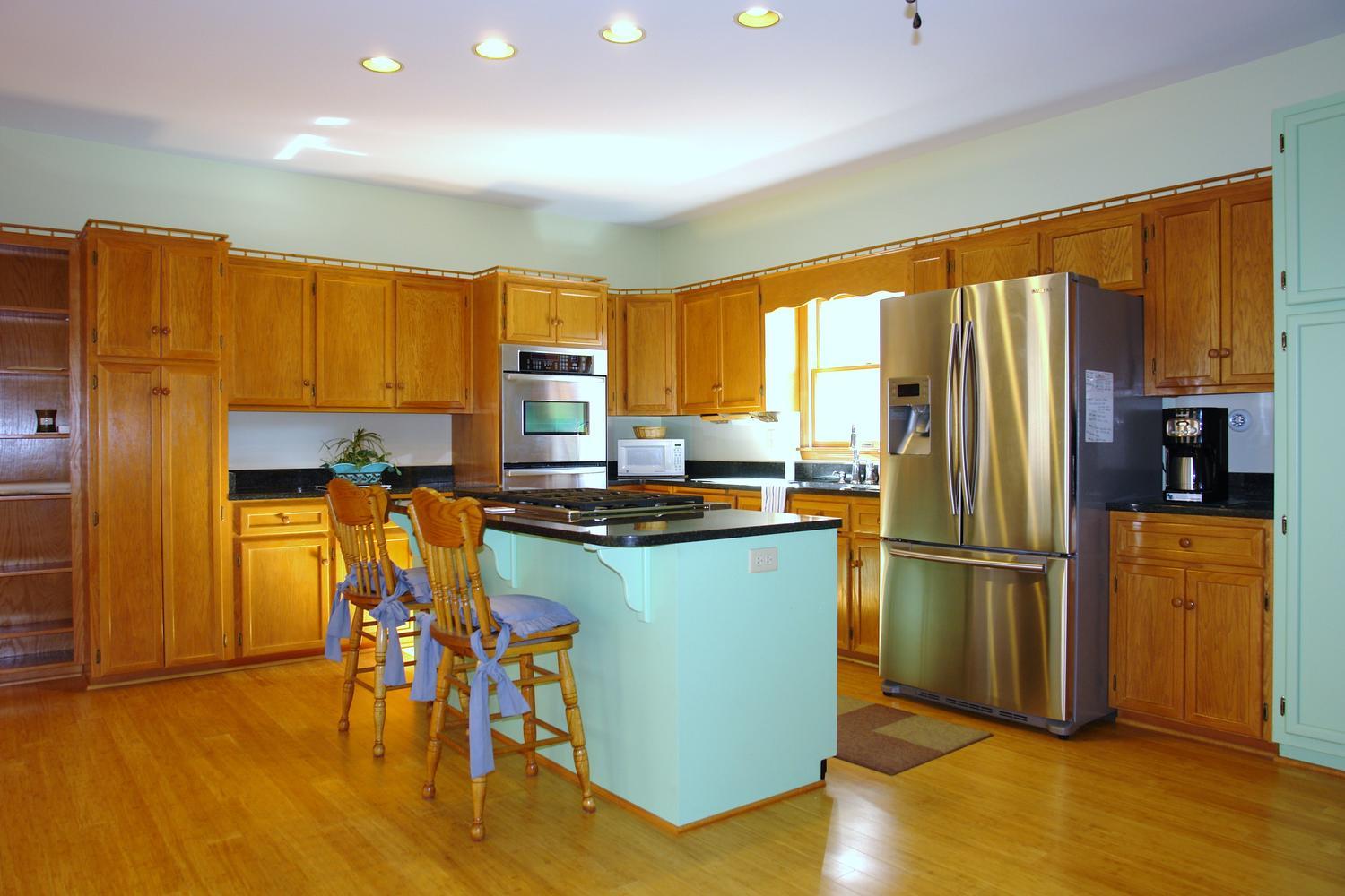 468 Liberty Road Penhook, VA 24137 - Photo 14 of 54 a kitchen with stainless steel appliances granite countertop a refrigerator and a stove top oven