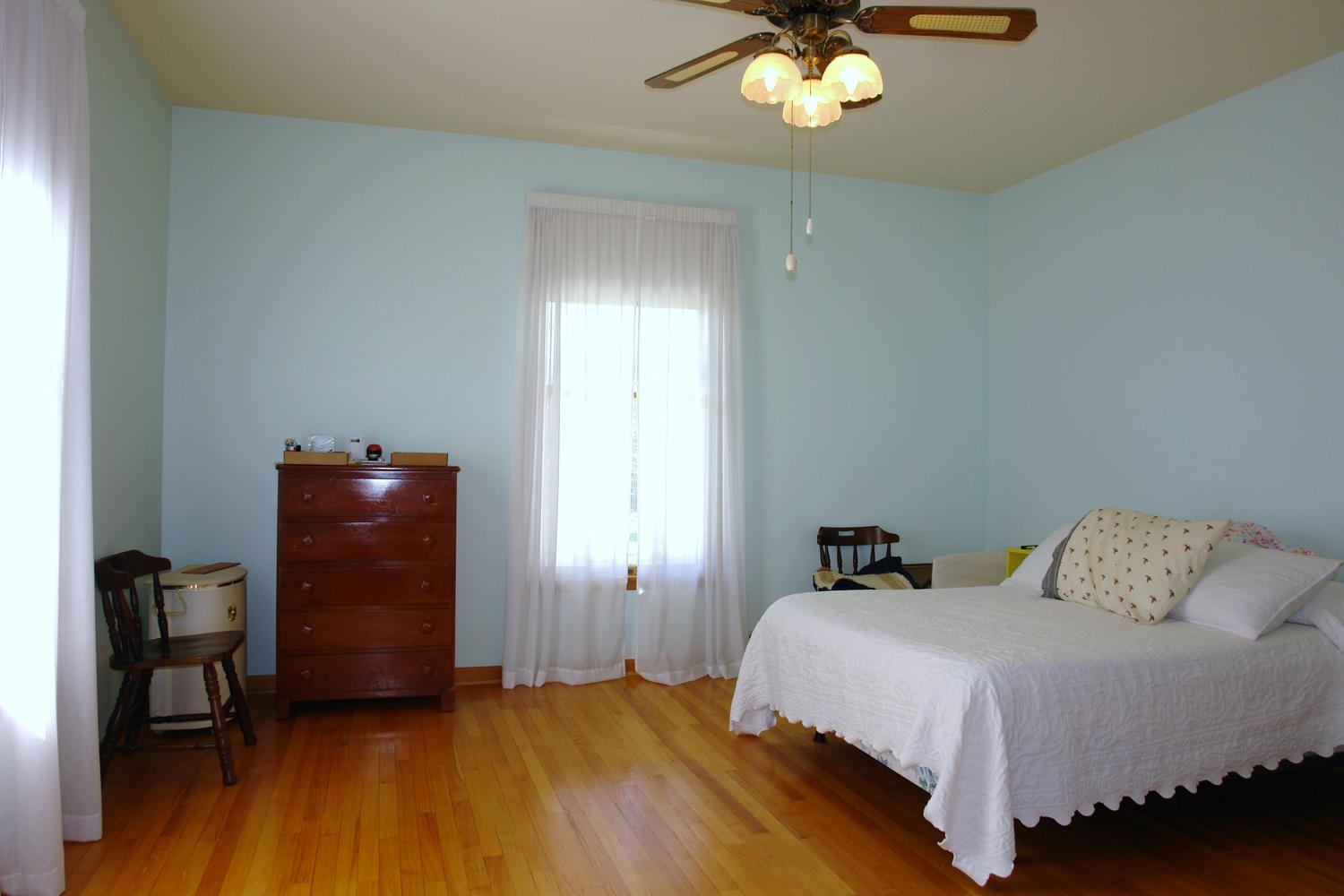 468 Liberty Road Penhook, VA 24137 - Photo 22 of 54 a bedroom with a bed and a dresser