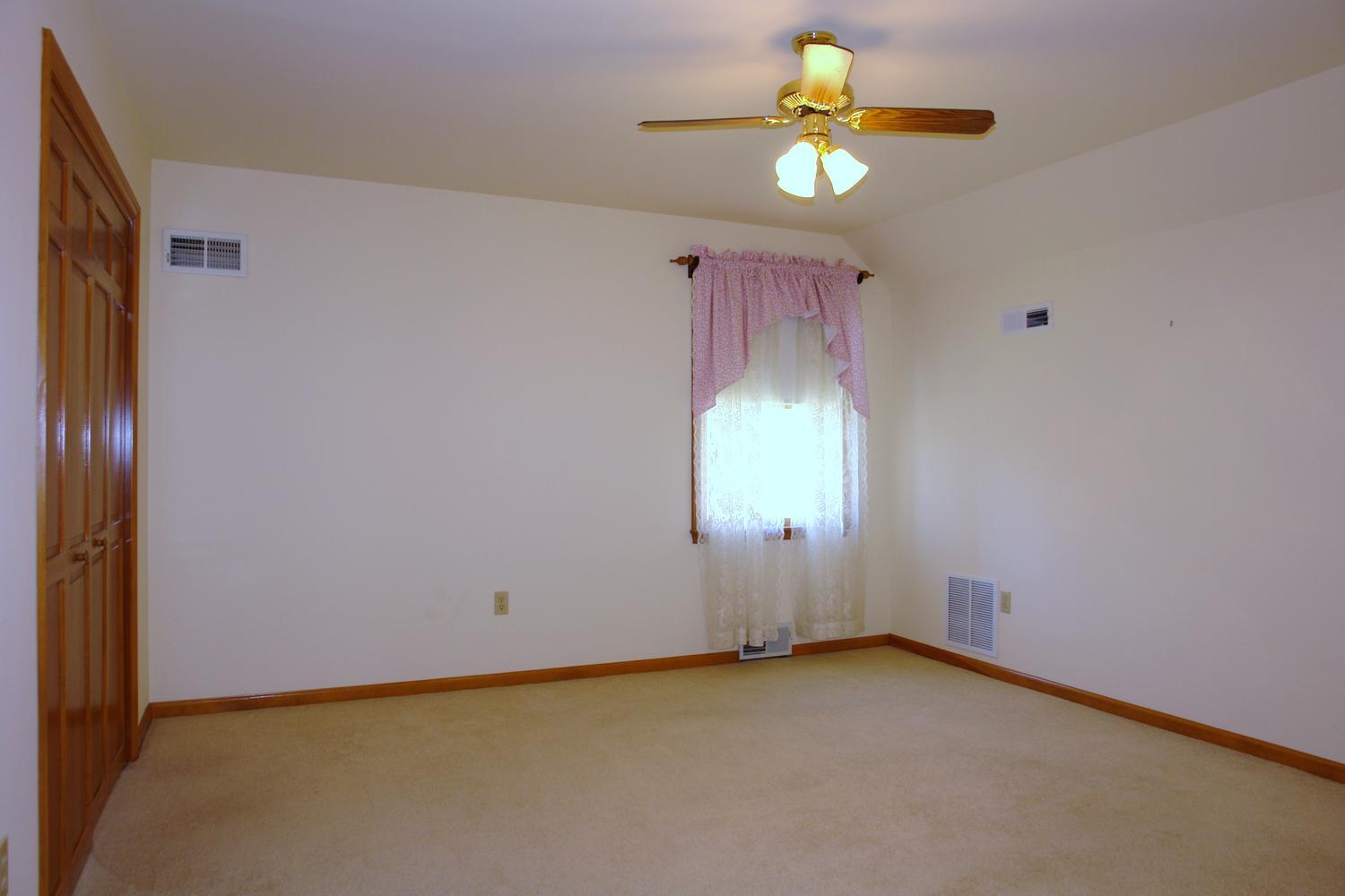 468 Liberty Road Penhook, VA 24137 - Photo 25 of 54 a view of an empty room with a window