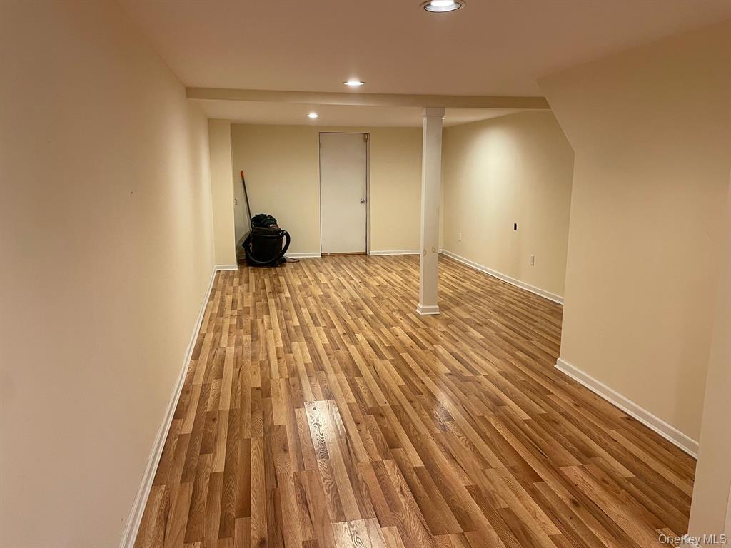 36 Bevin Road Northport, NY 11768 - Photo 19 of 26 Finished basement featuring light wood-style floors and recessed lighting