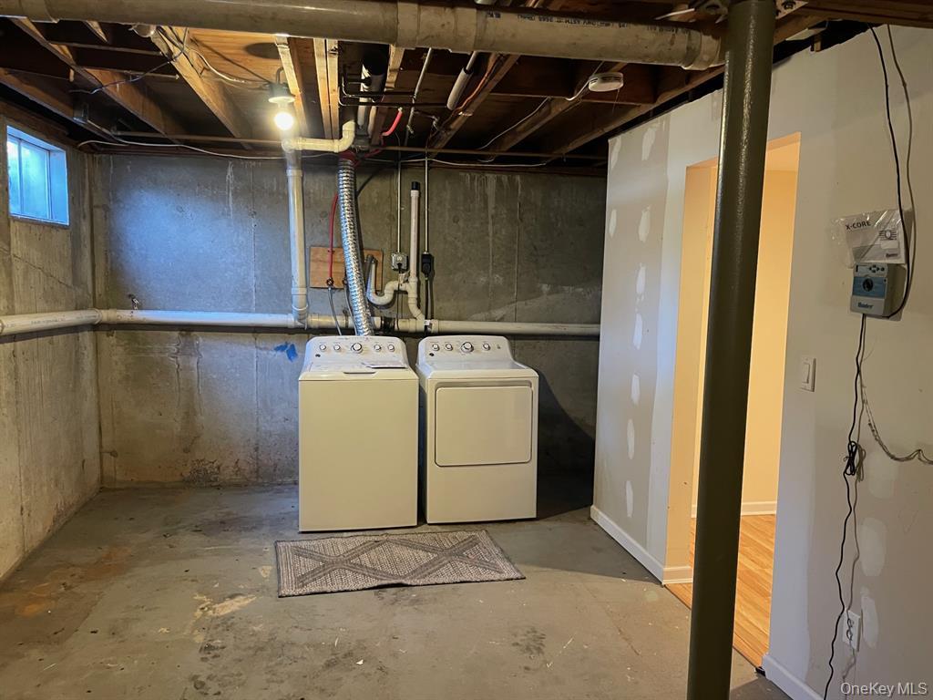 36 Bevin Road Northport, NY 11768 - Photo 20 of 26 Unfinished basement with separate washer and dryer