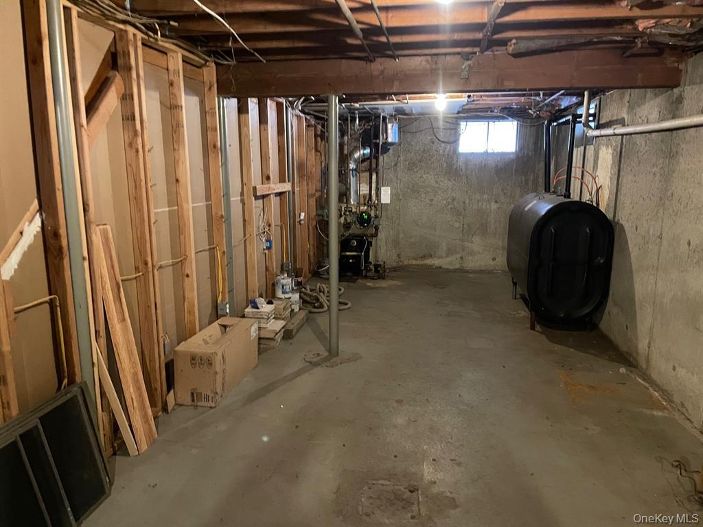 36 Bevin Road Northport, NY 11768 - Photo 21 of 26 Basement with heating fuel and a heating unit