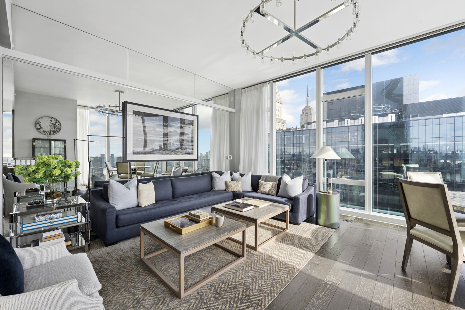 45 East 22nd Street, Unit 37B Manhattan, NY 10010 - Photo 4 of 13 a living room with furniture and a large window
