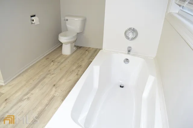 a bathroom with a sink and a toilet