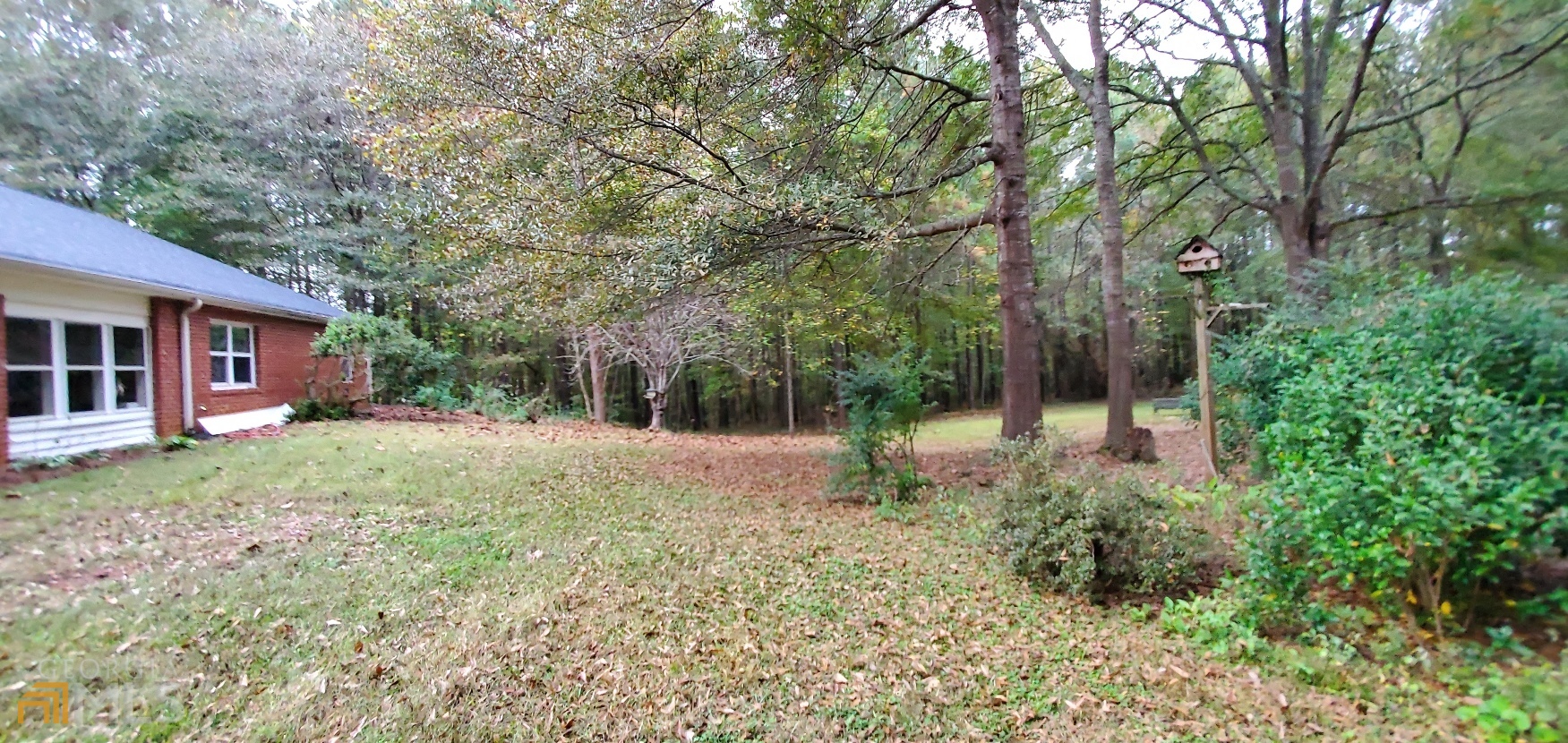 672 Andrew Bailey Road Sharpsburg, GA 30277 - Photo 34 of 34 front view of a house with a yard