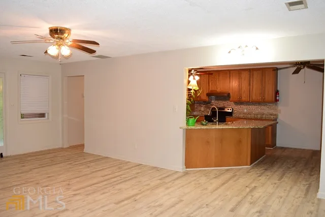 a view of kitchen and utility room