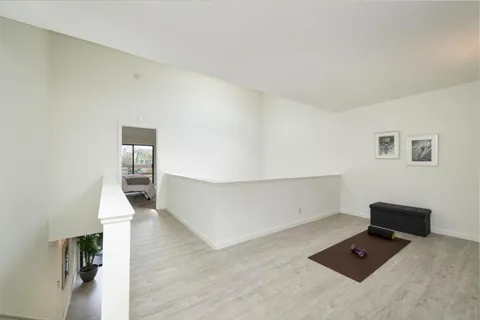 a view of workspace with wooden floor