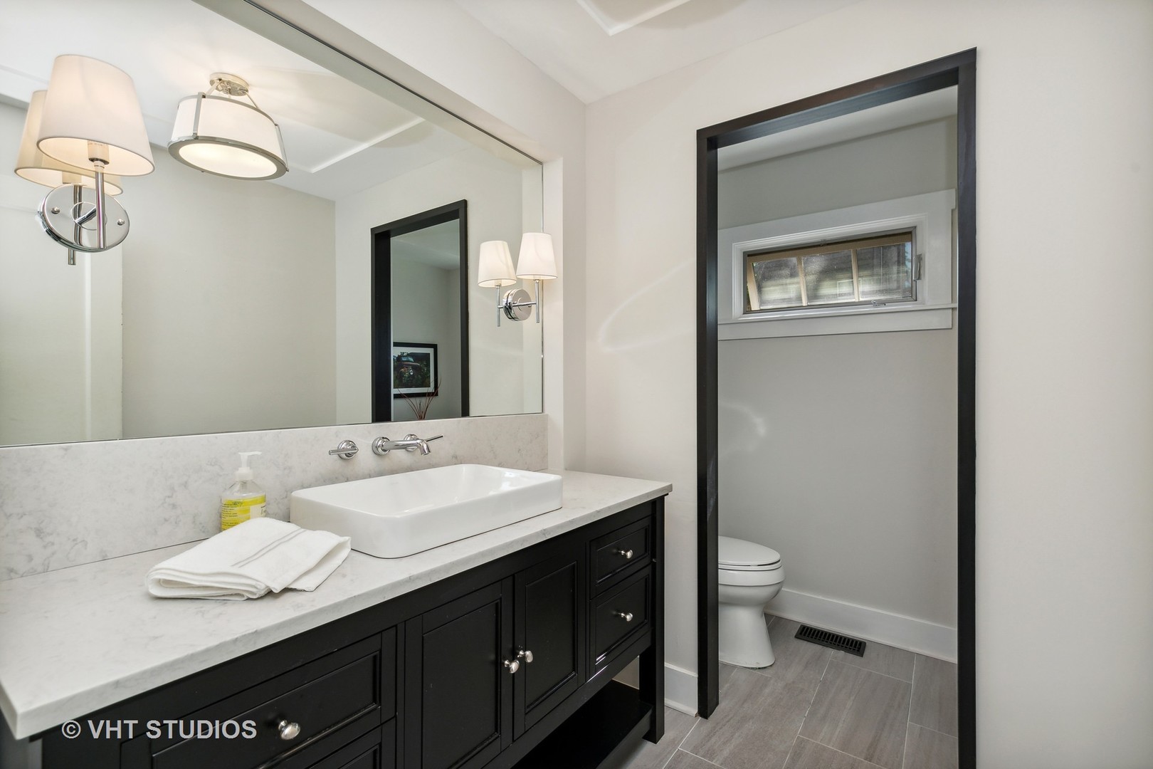 804 Murray Road Tower Lakes, IL 60010 - Photo 18 of 44 a bathroom with a granite countertop sink mirror vanity and toilet