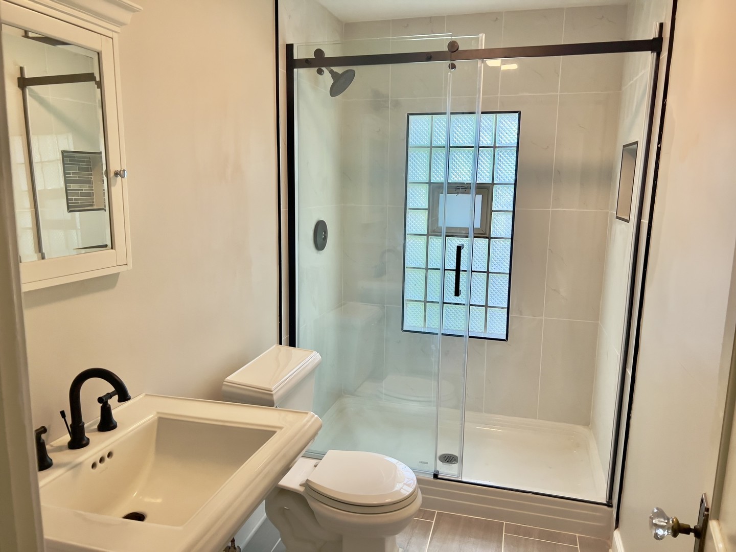 804 Murray Road Tower Lakes, IL 60010 - Photo 20 of 44 a bathroom with a sink toilet and shower