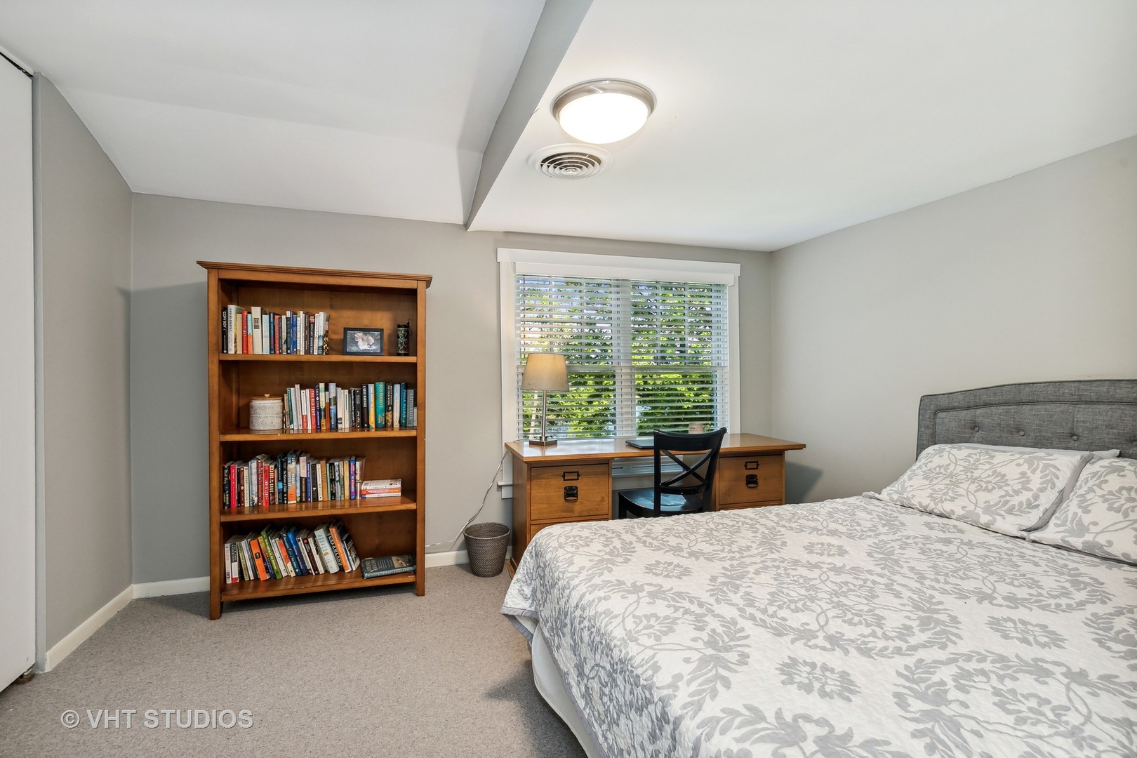804 Murray Road Tower Lakes, IL 60010 - Photo 22 of 44 a bed sitting in a bedroom next to a large window