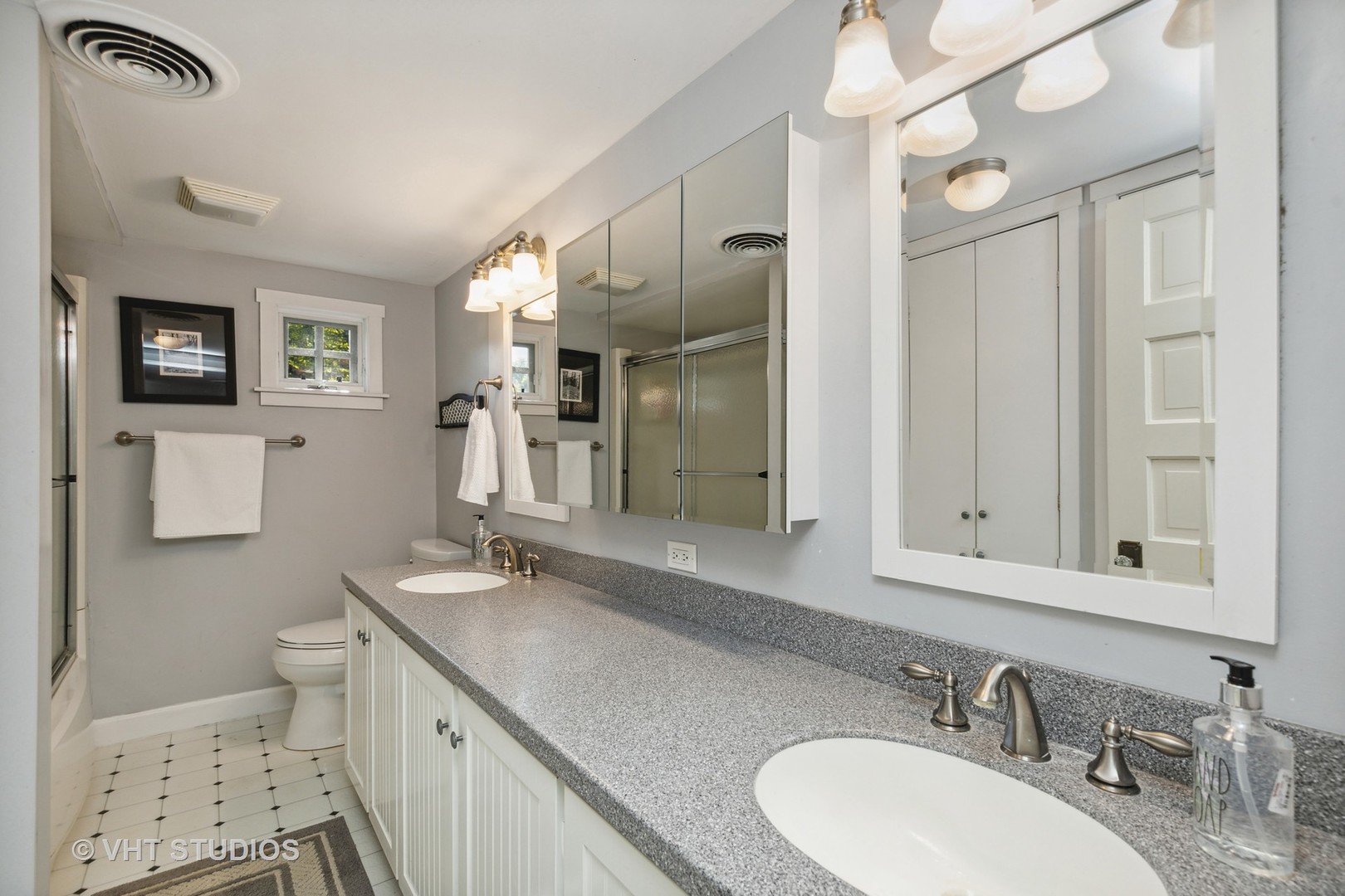 804 Murray Road Tower Lakes, IL 60010 - Photo 25 of 44 a bathroom with a sink double vanity granite and a toilet