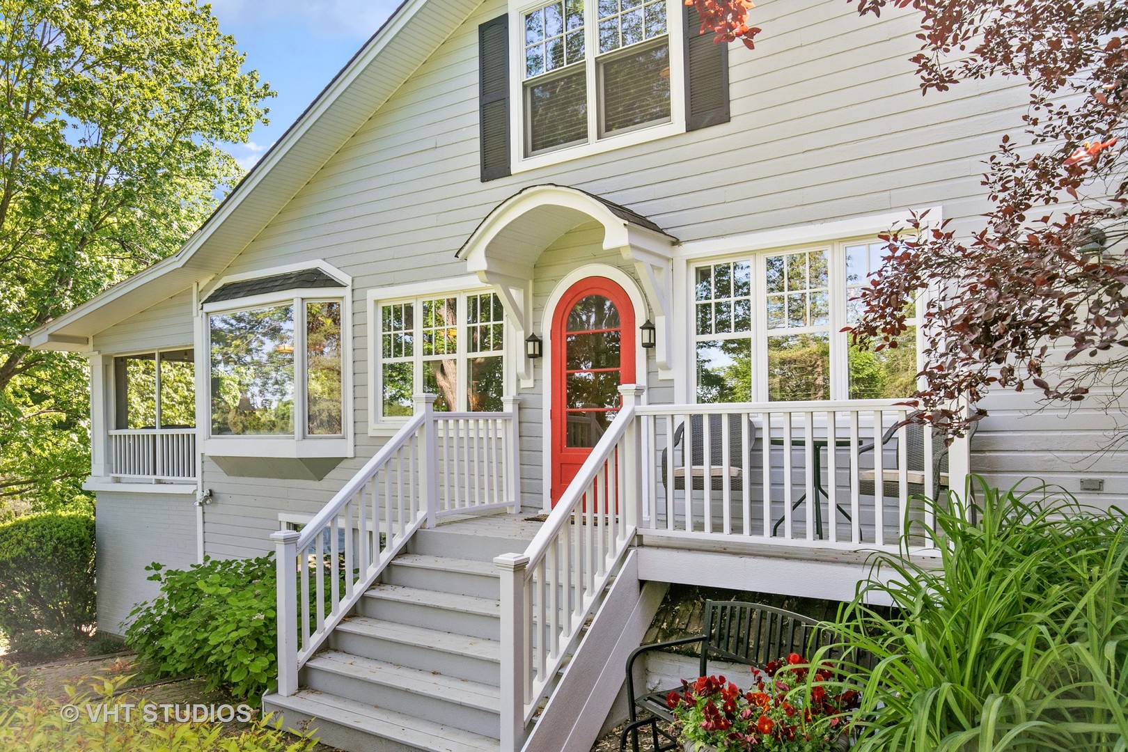 804 Murray Road Tower Lakes, IL 60010 - Photo 3 of 44 a view of a house with wooden porch and a large tree