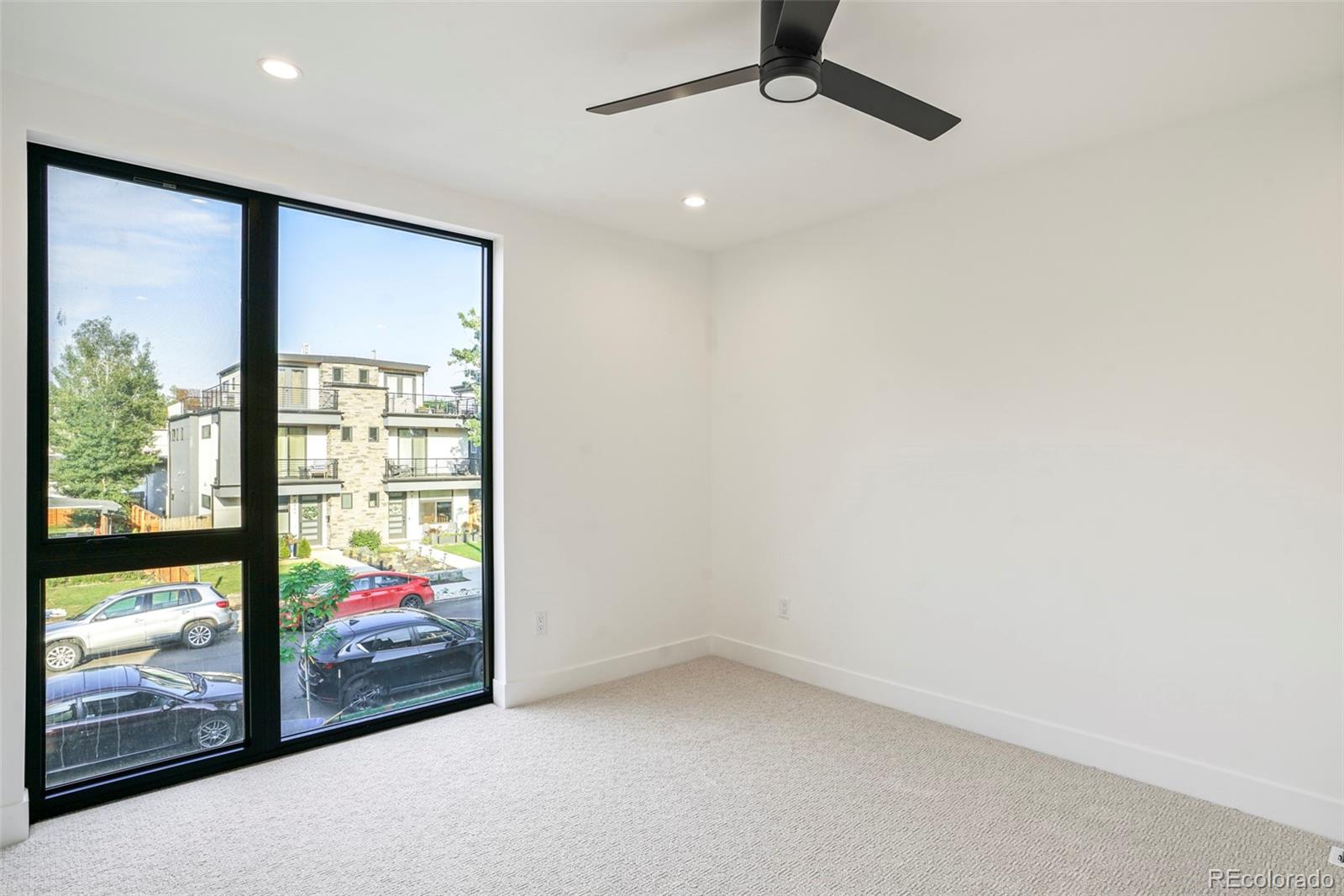 4449 Stuart Street Denver, CO 80212 - Photo 17 of 44 an empty room with window