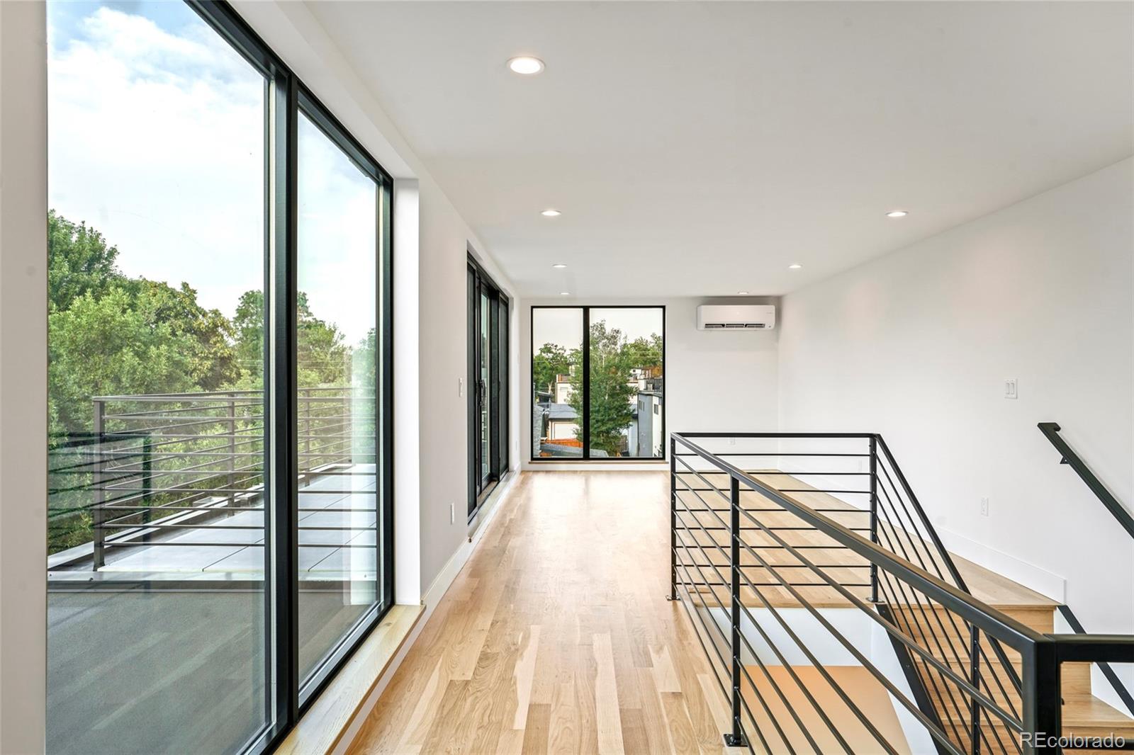 4449 Stuart Street Denver, CO 80212 - Photo 28 of 44 a view of balcony with a floor to ceiling window