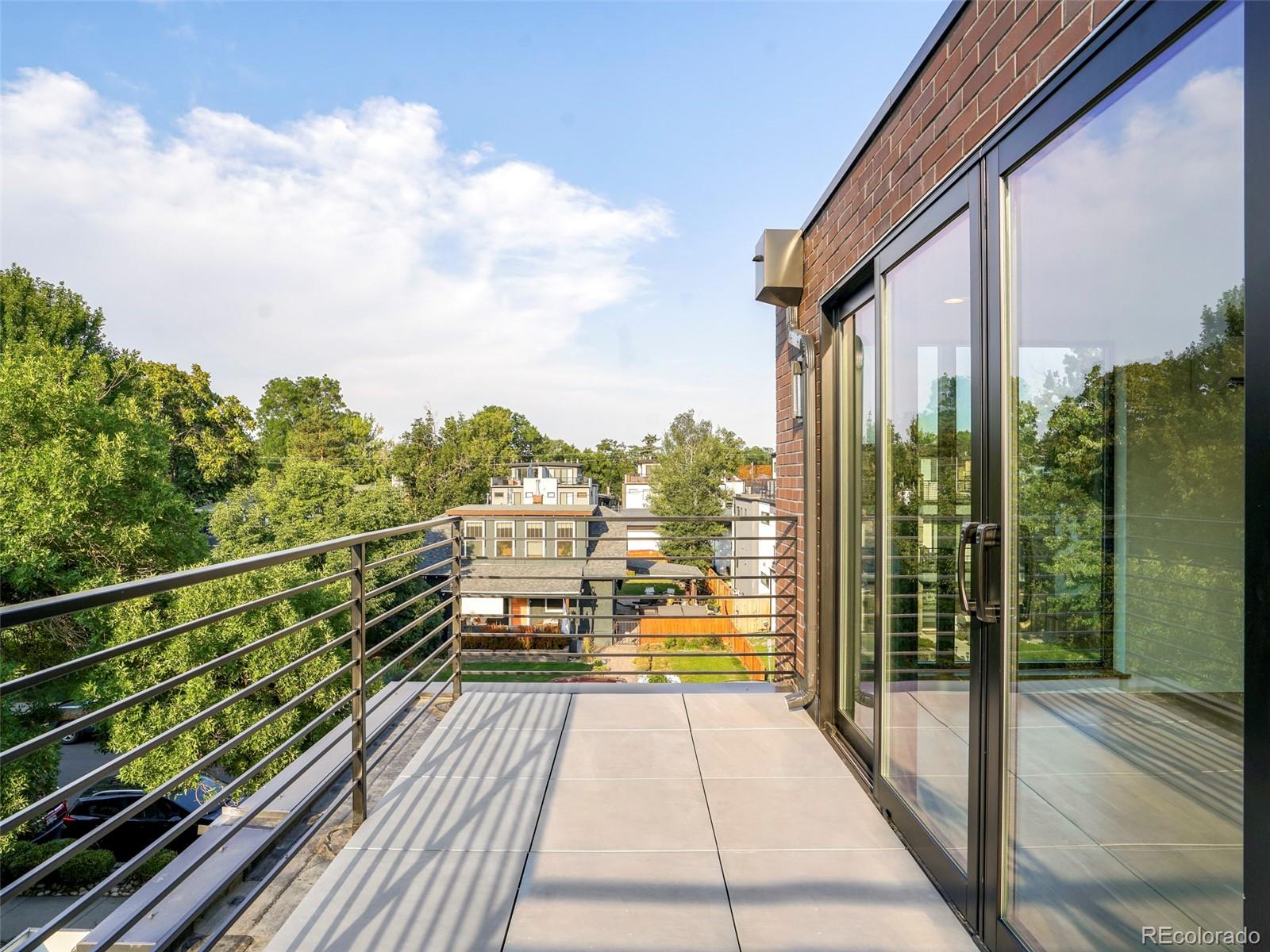 4449 Stuart Street Denver, CO 80212 - Photo 33 of 44 a view of balcony with couch