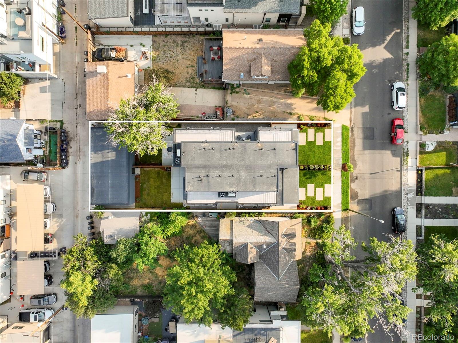 4449 Stuart Street Denver, CO 80212 - Photo 40 of 44 an aerial view of a house with a yard and garden