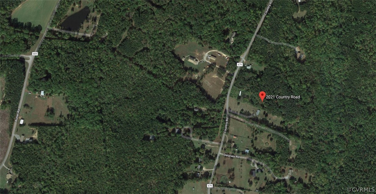 an aerial view of house with yard