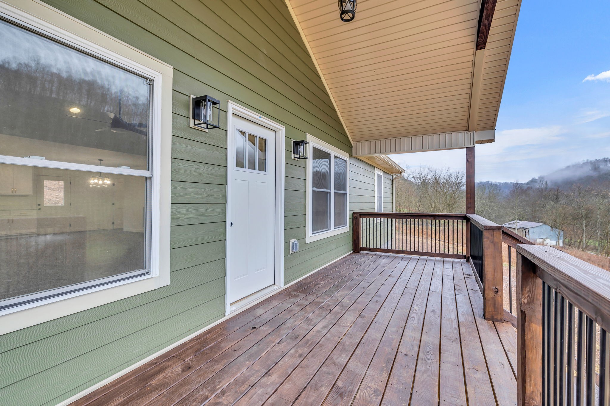 500 Difficult Road Pleasant Shade, TN 37145 - Photo 30 of 40 a view of deck with wooden floor and fence