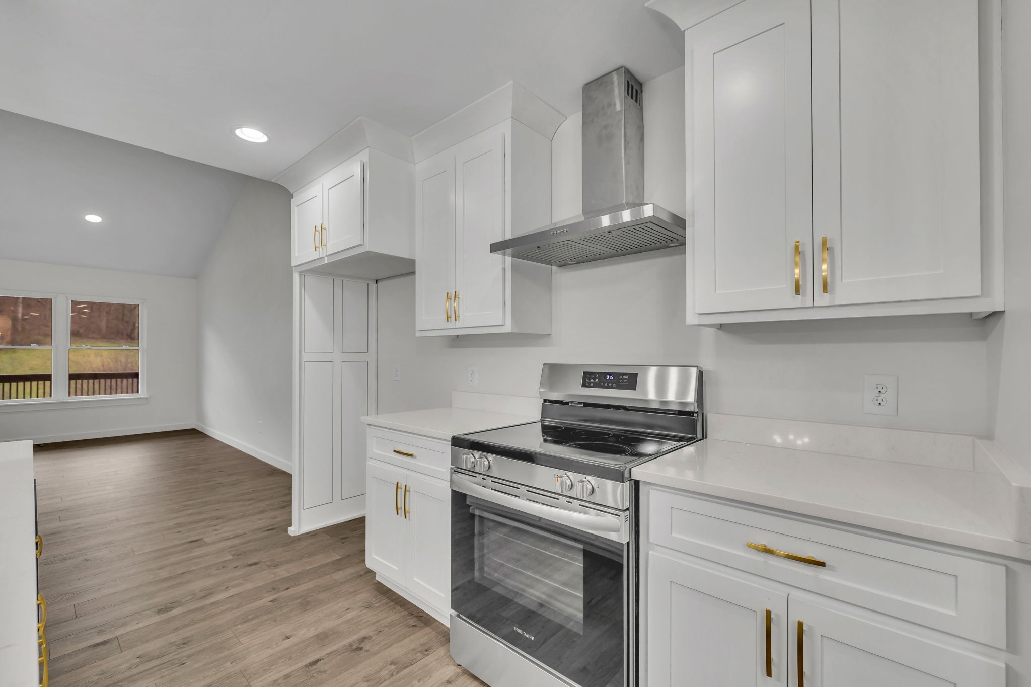 500 Difficult Road Pleasant Shade, TN 37145 - Photo 7 of 40 a kitchen with stainless steel appliances granite countertop a stove a sink and a refrigerator