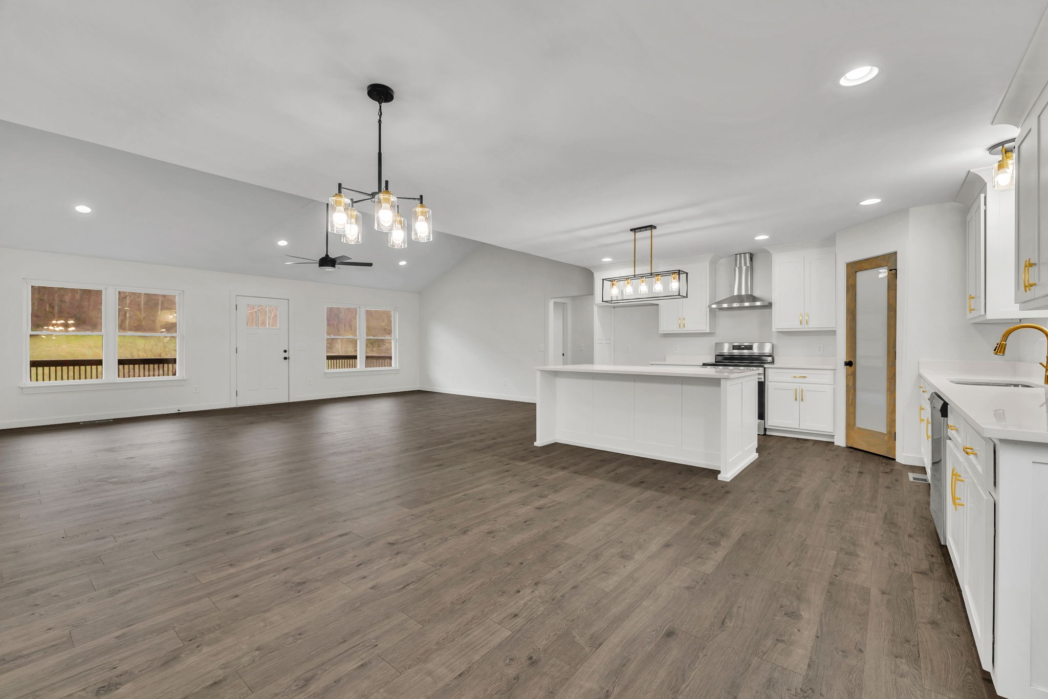 500 Difficult Road Pleasant Shade, TN 37145 - Photo 8 of 40 a view of a kitchen with a sink wooden floor and a window
