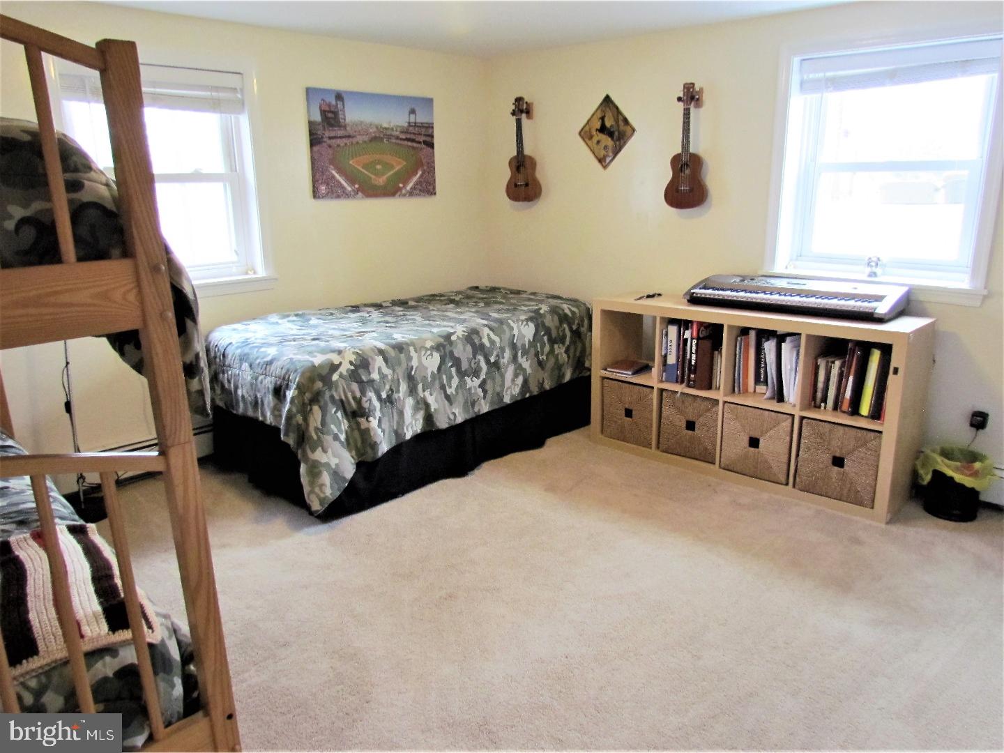 21 Woodside Road Perkasie, PA 18944 - Photo 19 of 25 a bedroom with a bed furniture and a window