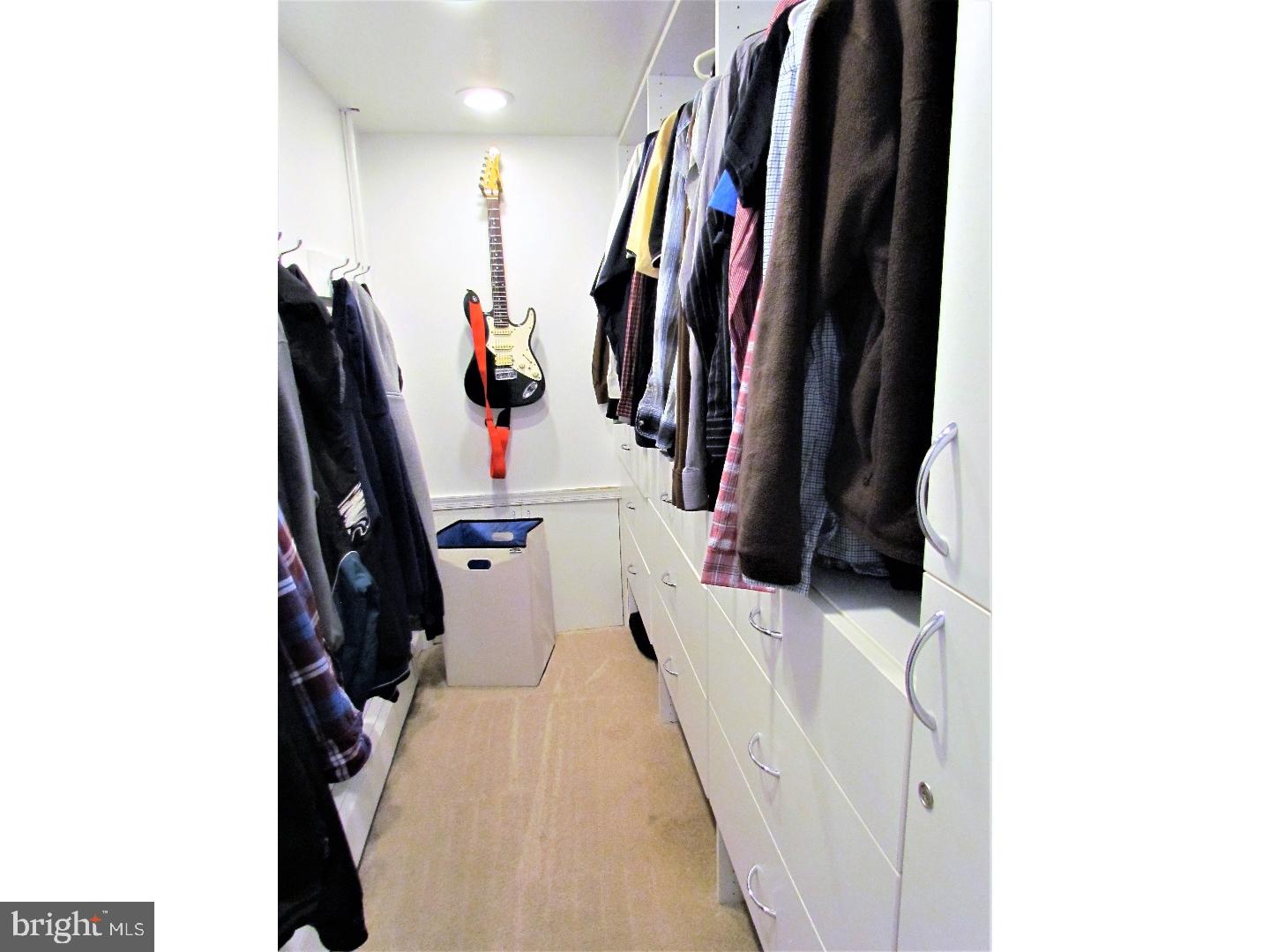 21 Woodside Road Perkasie, PA 18944 - Photo 21 of 25 a view of walk in closet with clothes and shoes