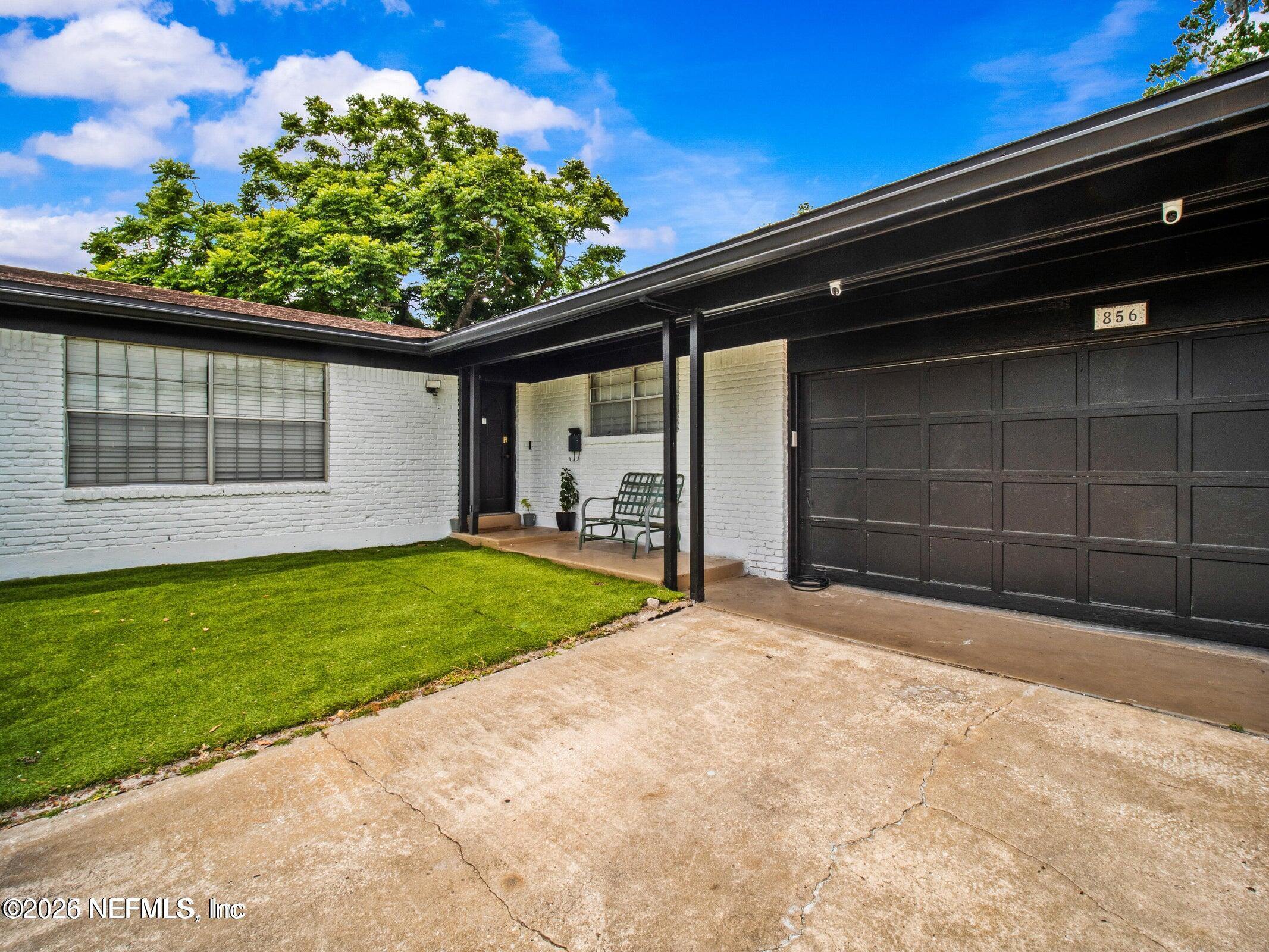 856 Palermo Road Jacksonville, FL 32216 - Photo 2 of 17 a view of a backyard of the house