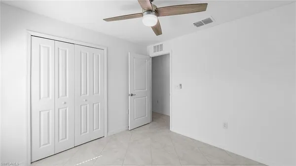 a bathroom with a double vanity sink and mirror