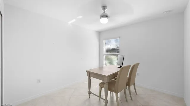 a view of a workspace with furniture