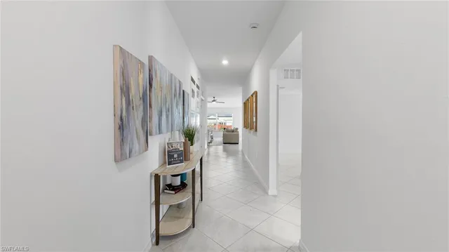 a view of a hallway with front door