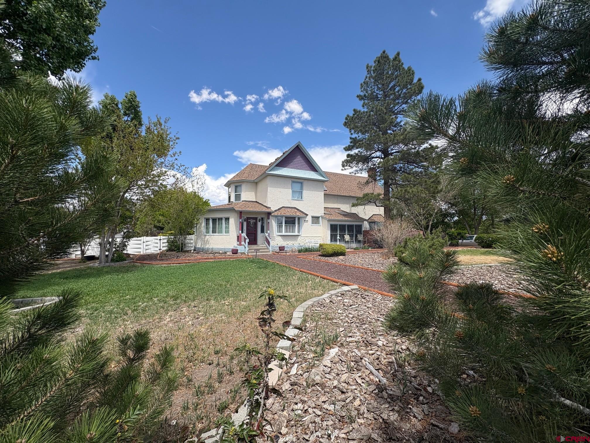 184 Garnet Avenue Delta, CO 81416 - Photo 4 of 36 a view of a house with a yard