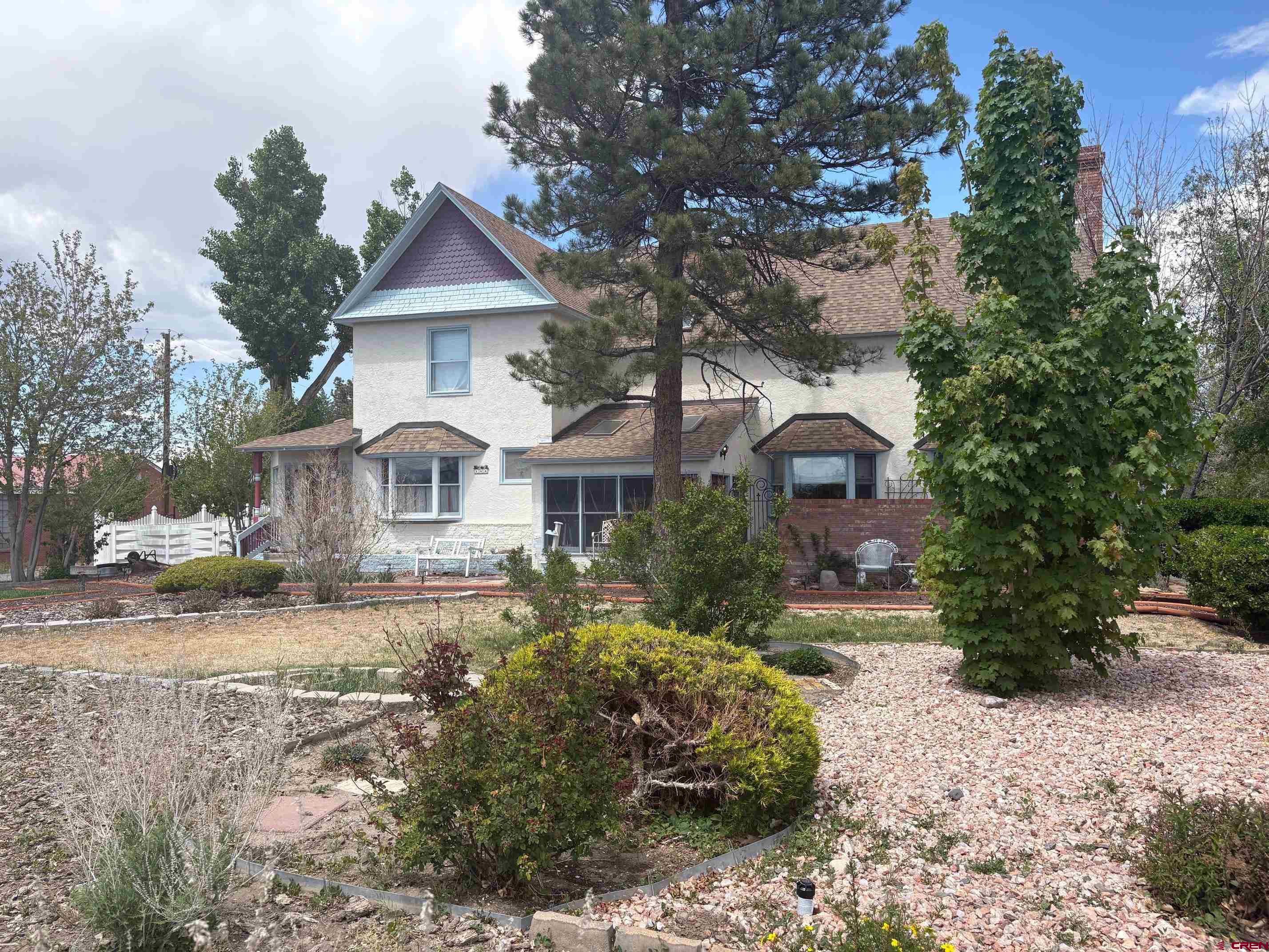 184 Garnet Avenue Delta, CO 81416 - Photo 5 of 36 a view of a house with a yard