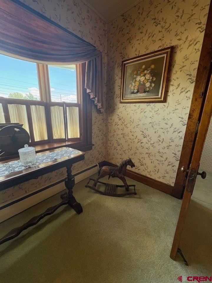 184 Garnet Avenue Delta, CO 81416 - Photo 9 of 36 a room with window and couch