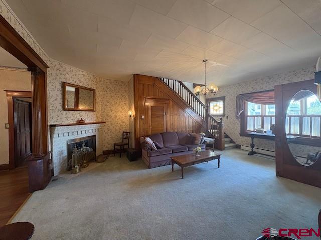 184 Garnet Avenue Delta, CO 81416 - Photo 10 of 36 a living room with furniture and a fireplace