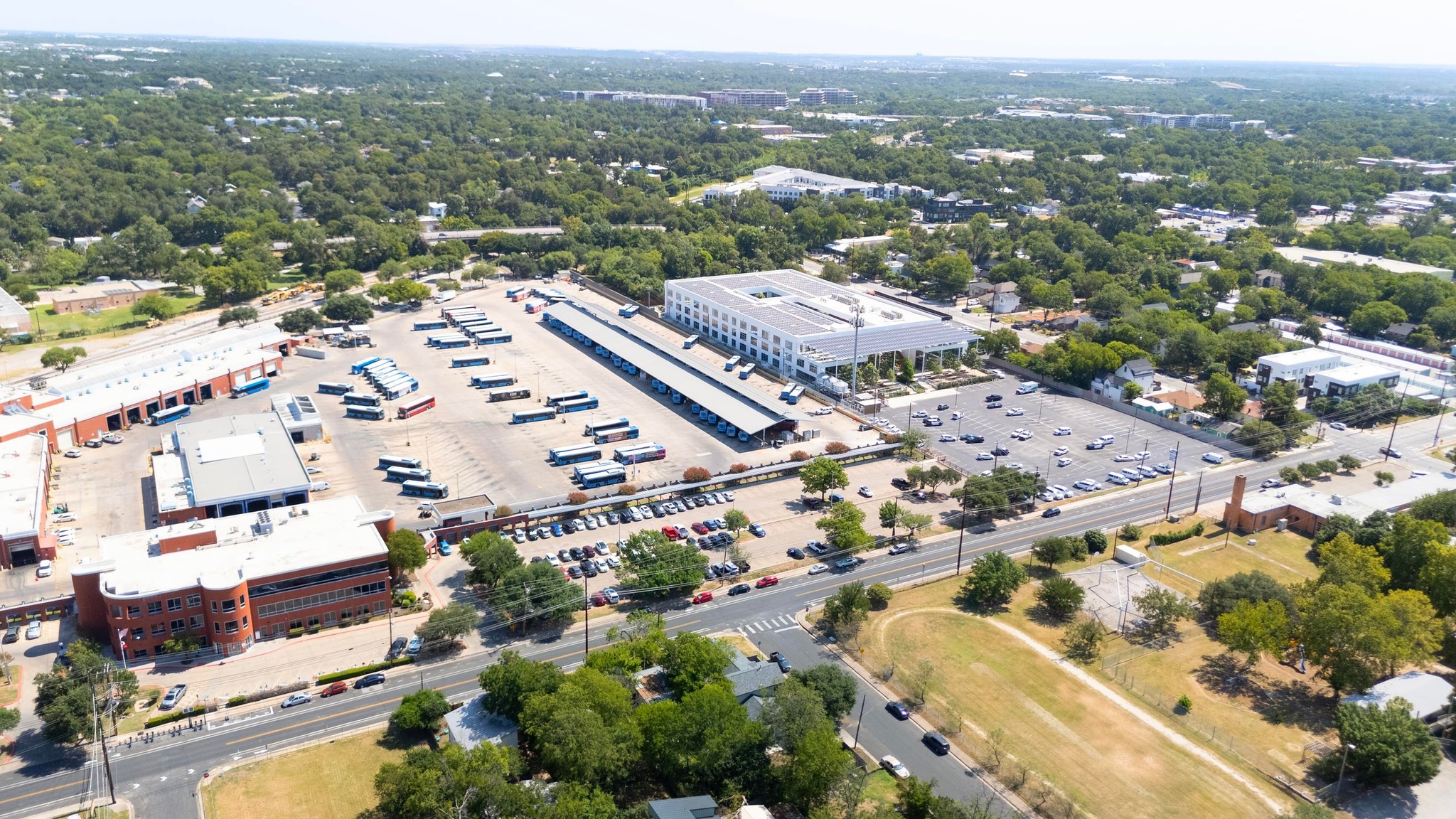 2909 East 5th Street Austin, TX 78702 - Photo 13 of 21 an aerial view of residential building with parking