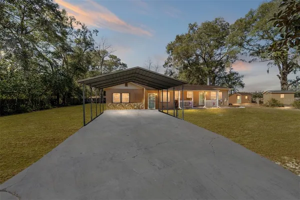 a view of swimming pool with a yard