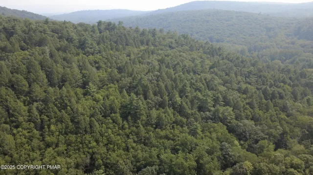 a view of swimming pool with seating area
