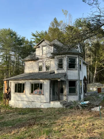 a view of a hallway with a building