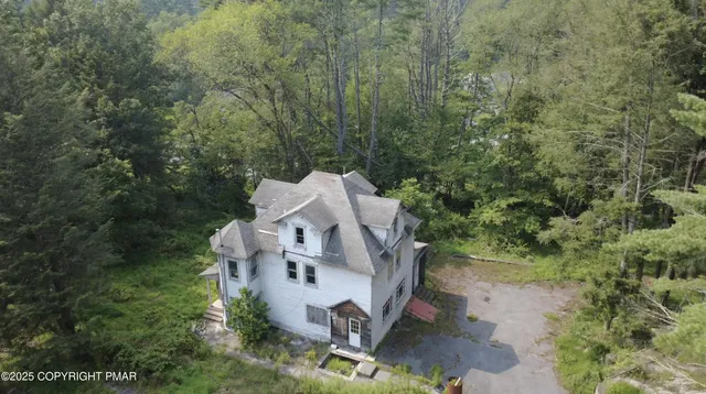 a view of backyard with green space