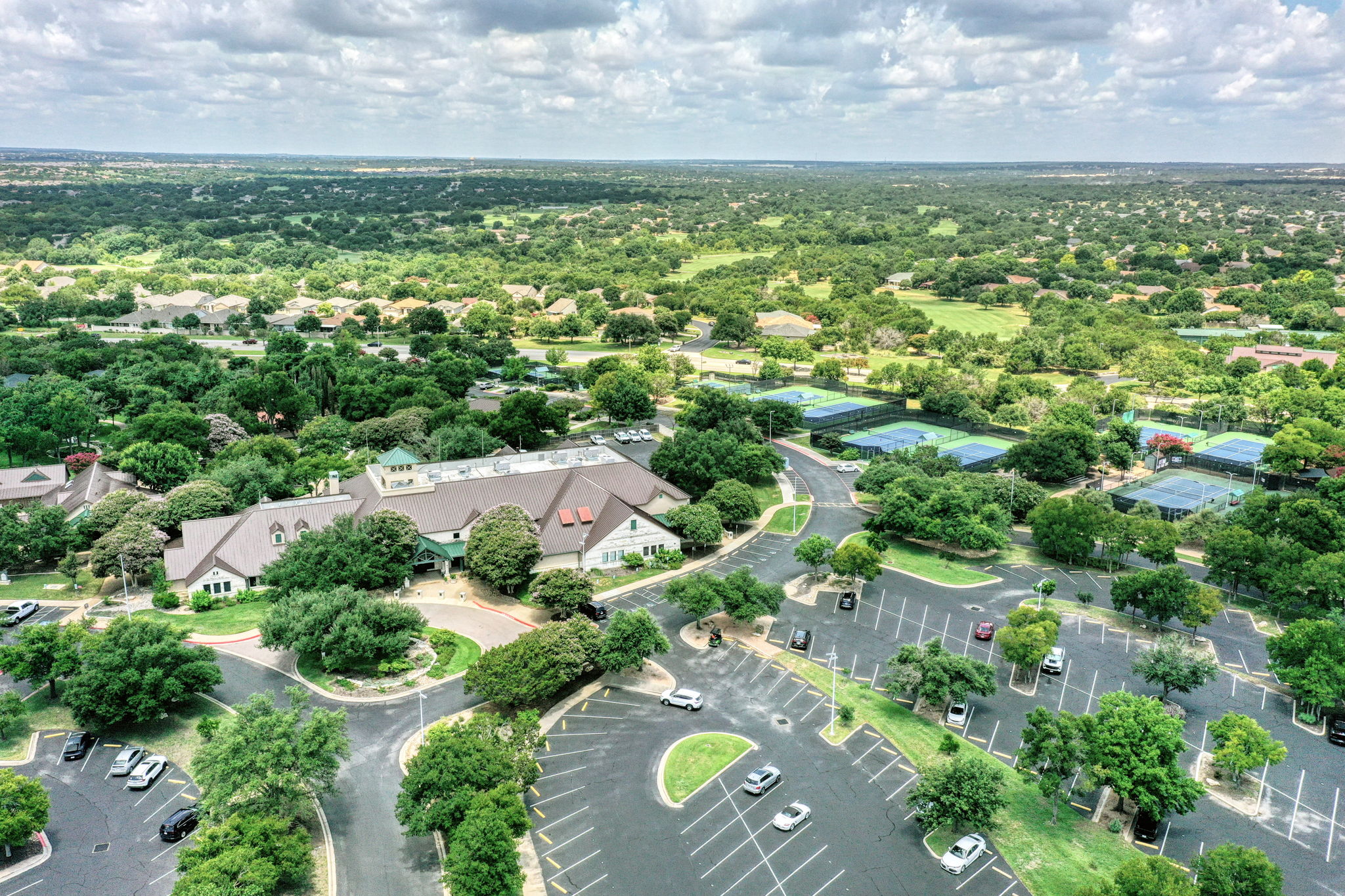 196 Whispering Wind Drive Georgetown, TX 78633 - Photo 27 of 34 an aerial view of residential houses with outdoor space and trees