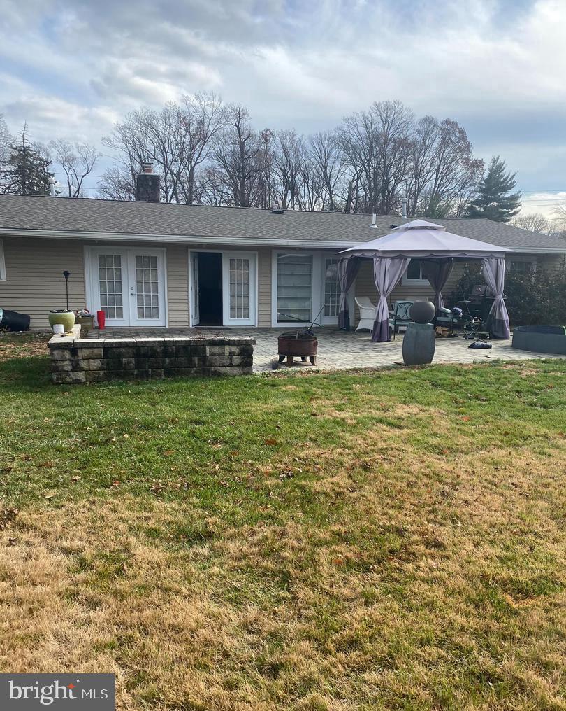 335 Cherry Hill Boulevard Cherry Hill, NJ 08002 - Photo 16 of 17 a view of a house with swimming pool and a yard