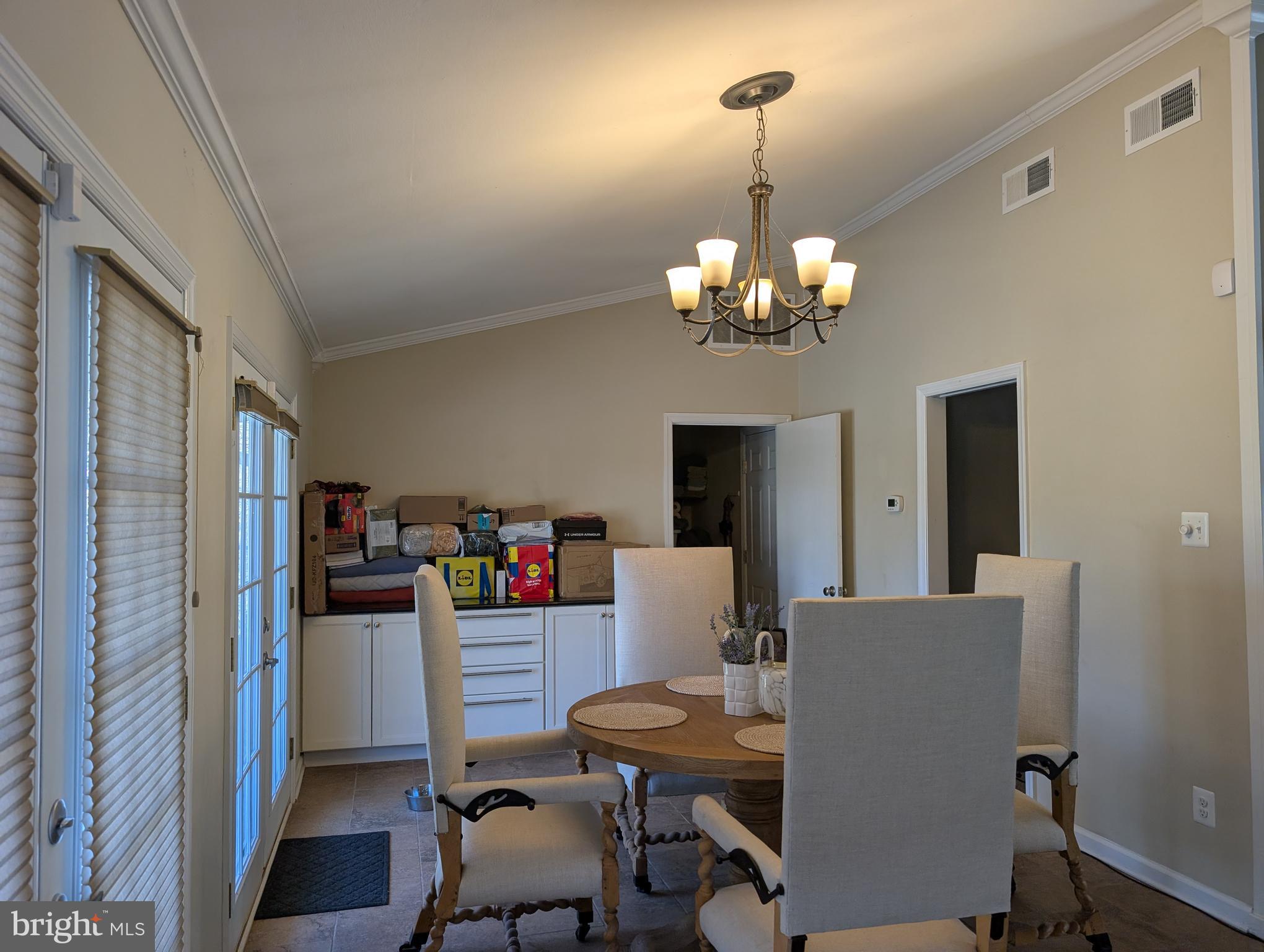 335 Cherry Hill Boulevard Cherry Hill, NJ 08002 - Photo 8 of 17 a view of a dining room with furniture and a chandelier