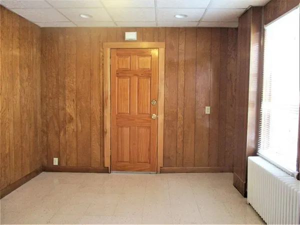 an empty room with windows