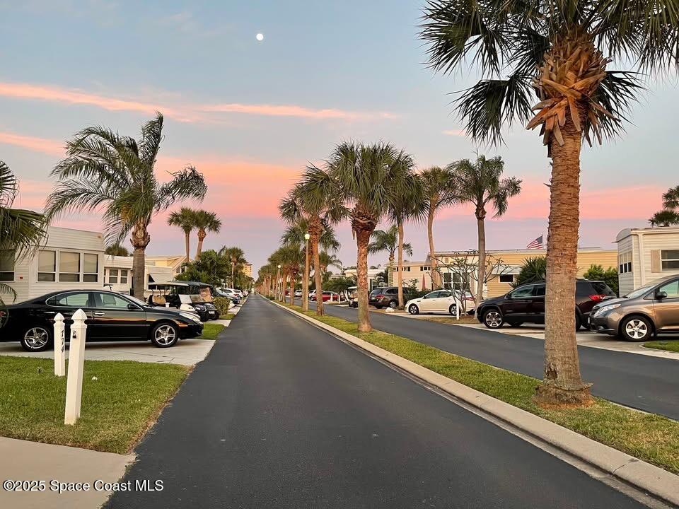 773 Carousel Lane Melbourne Beach, FL 32951 - Photo 10 of 19 a view of a street with a cars park