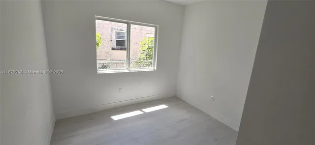 an empty room with a window