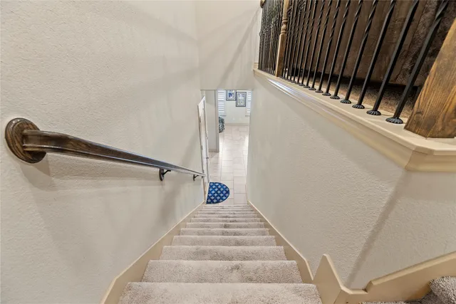 a view of balcony with wooden floor
