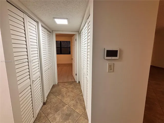 a view of workspace with wooden floor
