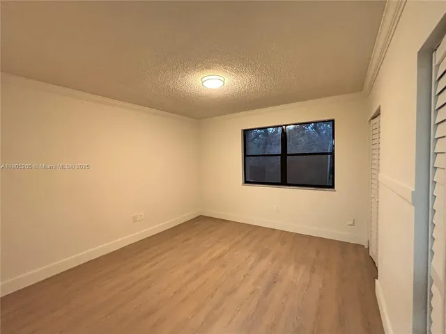 an empty room with closet